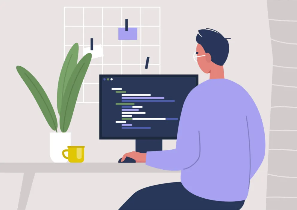 Person at desk on a computer